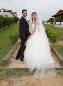 bride and groom on the steps