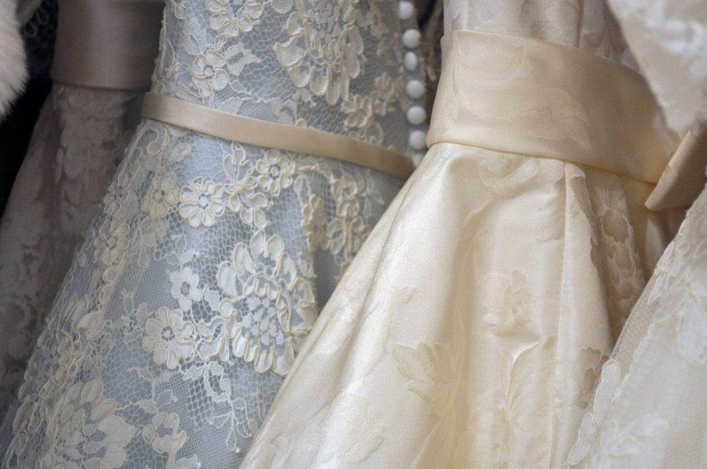 wedding dresses in a rack